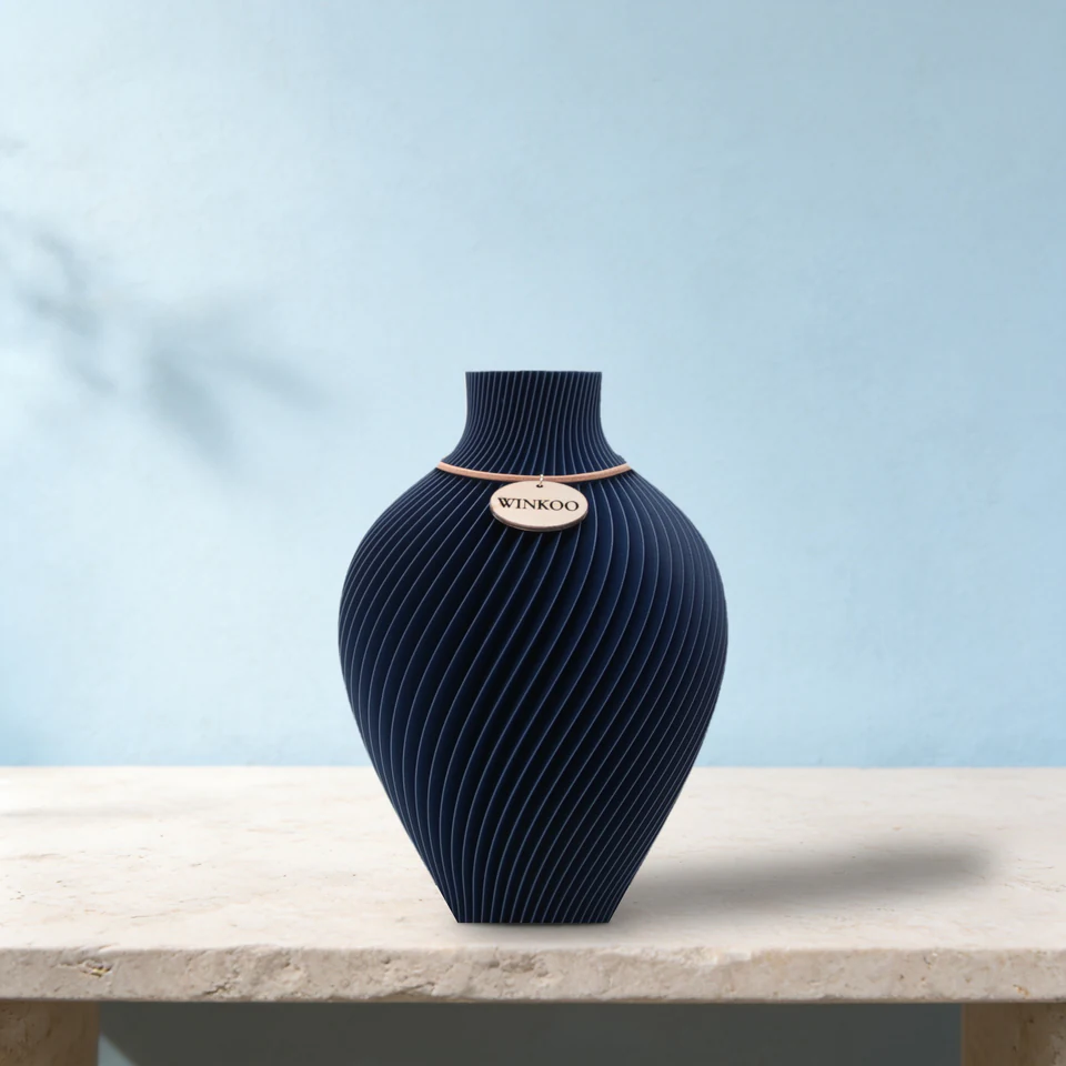 Noma sculptural vase in Royal Blue by WINKOO