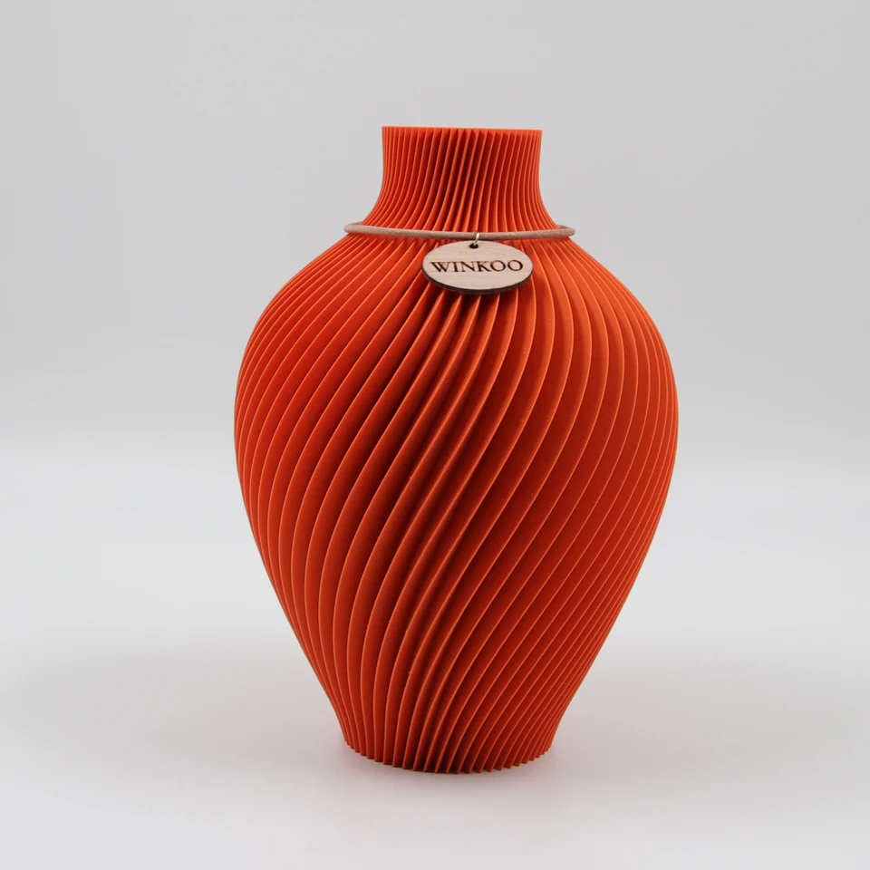 Noma sculptural vase in Sunlit Terracotta by WINKOO