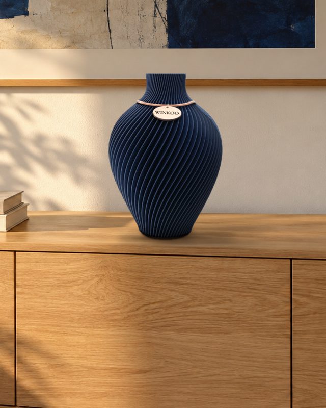 The same sideboard with one Royal Blue Noma vase picking up the blue in the print